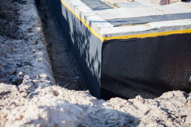 Professional Waterproofing technician working in Baldwin, NY